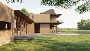 Ein modernes Haus mit großer Glasfassade, flachem Dach und großzügigem Außenbereich mit Rasen und Sitzgelegenheiten.
