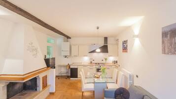 Apartment (1 Bedroom) | Living area | 32-inch Smart TV with digital channels
