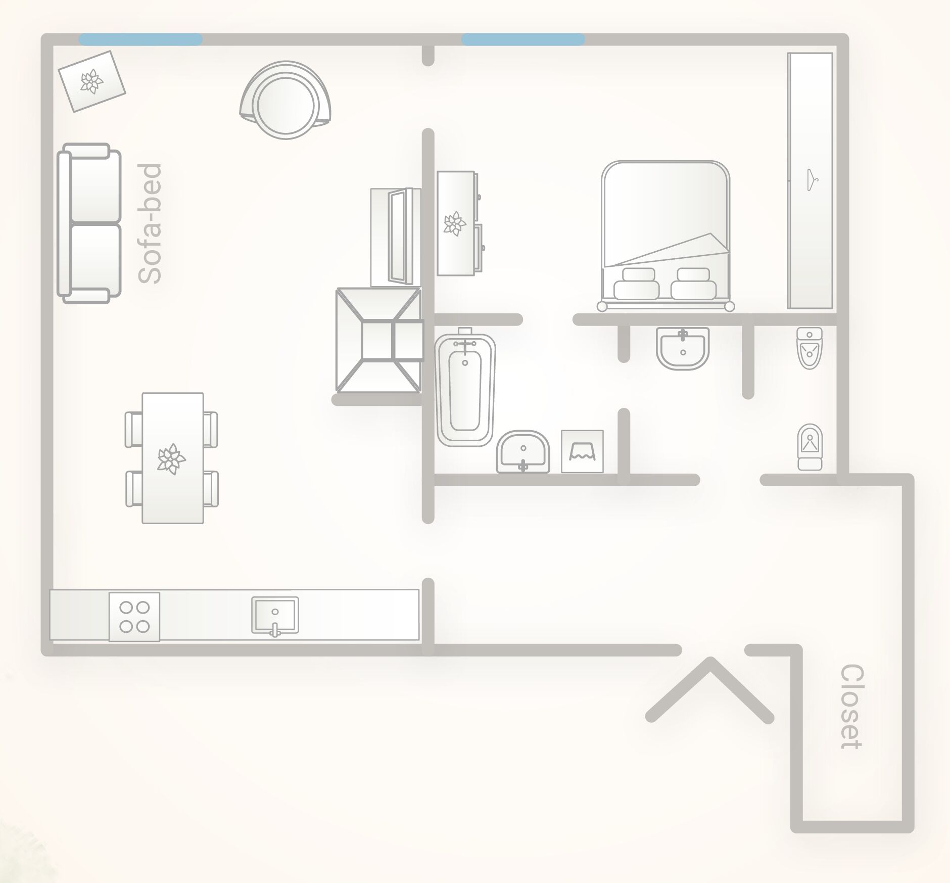 A floor plan of a hotel room with a sofa-bed, a dining table, a kitchen area, and a closet.