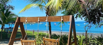 It is important to note that the Villa does NOT offer access to a pool.<br><br>Nestled on a hillside with breathtaking ocean views, this luxurious villa combines modern comfort with serene natural beauty.
