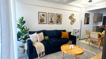 Comfort Apartment, Balcony, City View | Living area | Flat-screen TV