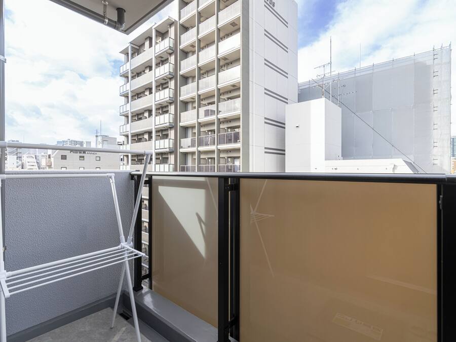 Apartamento executivo, vista para a cidade | Sacada