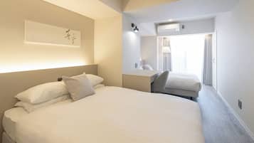 Desk, laptop workspace, blackout curtains, iron/ironing board