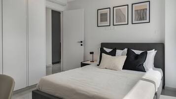 Luxury Apartment, Sea View | 2 bedrooms, in-room safe, blackout drapes, iron/ironing board