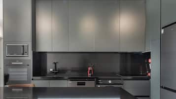 Luxury Apartment, Sea View | 2 bedrooms, in-room safe, blackout curtains, iron/ironing board