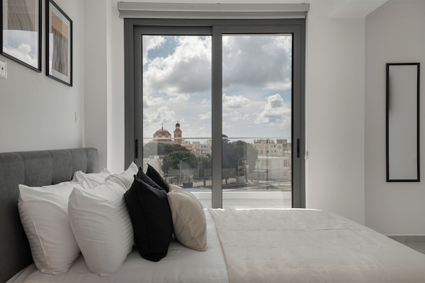 Luxury Apartment, Sea View | 2 bedrooms, in-room safe, blackout drapes, iron/ironing board