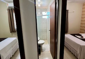 Quadruple Room | Bathroom | Shower, towels, soap, toilet paper