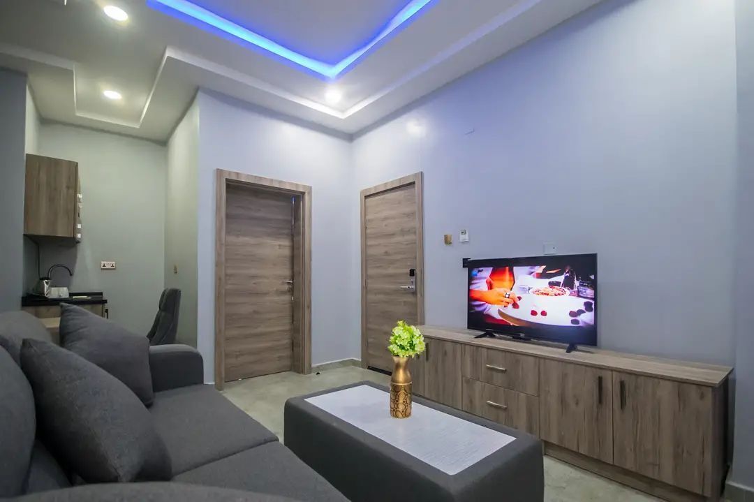 Deluxe Room, Balcony, City View | Living area