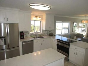 Fridge, microwave, oven, stovetop - Oceanfront | Modern 2BR w/Pool & Beach Access (St. Augustine)