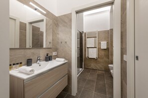 Shower, free toiletries, hair dryer, towels