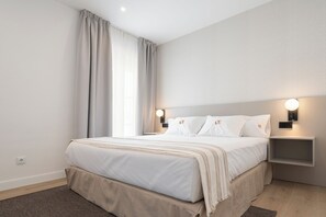 Deluxe Room, Balcony, City View | In-room safe, desk, laptop workspace, free WiFi