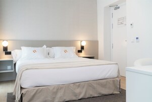 Deluxe Room, Balcony, City View | In-room safe, desk, laptop workspace, soundproofing