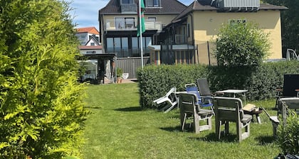 Dreamlike apartment house on the lakeshore port side