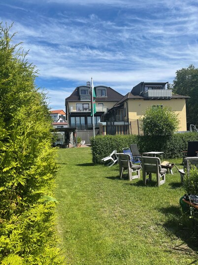 Dreamlike apartment house on the lakeshore port side