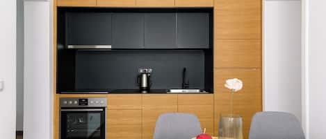 Family Apartment, 2 Bedrooms | Private kitchen | Full-size fridge, oven, stovetop, electric kettle