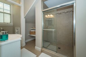 Shower, hair dryer, towels, soap