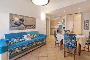 Family Apartment, Multiple Bedrooms (Domus 21 Near Alassio Beach) | Living area | 21-inch flat-screen TV with satellite channels