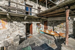 Family Chalet, Multiple Bedrooms, Mountainside (Rustico Over The Bridge Verzasca 2) | Outdoor dining - Rustico Over The Bridge Verzasca (Sonogno)
