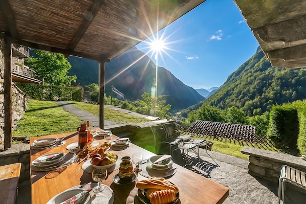 Family Chalet, Multiple Bedrooms, Mountainside (Rustico Over The Bridge Verzasca 1) | Outdoor dining