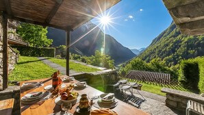 Family Chalet, 3 Bedrooms, Balcony, Mountainside (Rustico Over The Bridge Verzasca 2) | Outdoor dining - Rustico Over The Bridge Verzasca (Sonogno)