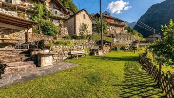 Family Chalet, Multiple Bedrooms, Mountainside (Rustico Over The Bridge Verzasca 1) | Garden
