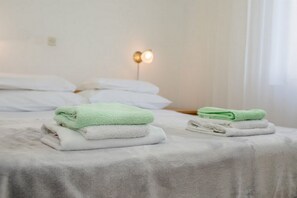 Family Apartment, Multiple Bedrooms (Oasis Of Peace In Lopar) | 1 bedroom, iron/ironing board, free WiFi, bed sheets