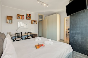 Apartamento familiar, varias habitaciones, junto a la montaña (Casa Tecitt) | 1 dormitorio, tabla de planchar con plancha, wifi y ropa de cama