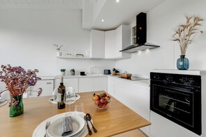 Family Apartment, Multiple Bedrooms (Sky View Apartment Monopoli) | Private kitchen | Fridge, oven, stovetop, dishwasher