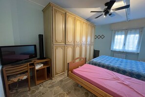 1 bedroom, laptop workspace, bed sheets