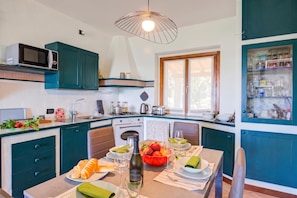 Family Apartment, 2 Bedrooms, Microwave, Mountainside (Lakeview Bliss / pool & fenced Garden) | Private kitchen