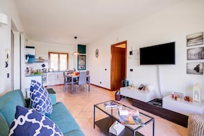 Family Apartment, 2 Bedrooms, Microwave, Mountainside (Lakeview Bliss / pool & fenced Garden) | Living area | Smart TV - Lakeview Bliss / Pool & Fenced Garden (Villanuova sul Clisi)