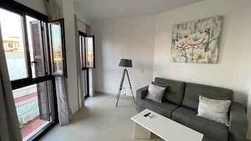 Comfort Apartment, 1 Bedroom, City View | Living area | Flat-screen TV