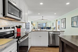 Fridge, microwave, oven, stovetop - Spectacular views from this 2nd Row West side Duplex - New for 2025 Shared Pool (Emerald Isle)