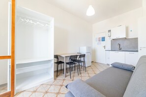 Apartment, Balcony, Sea View | Living area | 32-inch flat-screen TV with cable channels - Sea View Apartment Ac Gallipoli (Gallipoli)