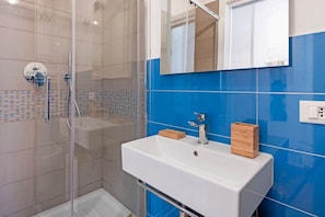 Shower, hair dryer, bidet, shampoo