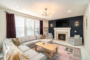 TV, fireplace - KC Oasis: Pool, Hot Tub, Sauna (Olathe)