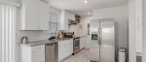 Microwave, stovetop, dishwasher, coffee/tea maker