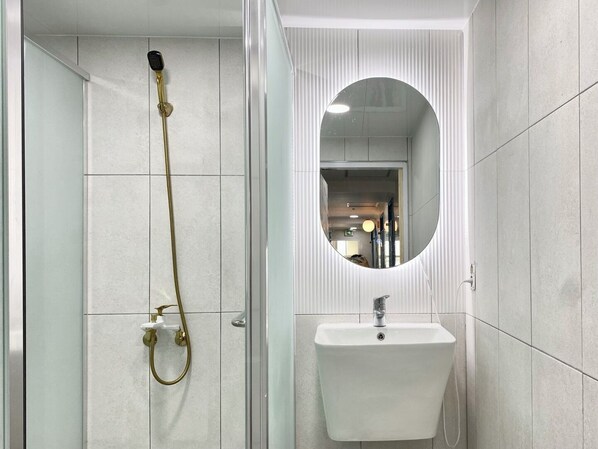 Hair dryer, slippers, towels, soap