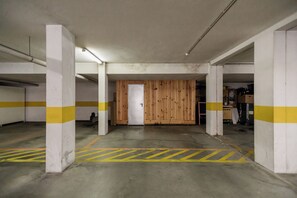 Park your vehicle in this designated parking area with convenient access to adjacent spaces.