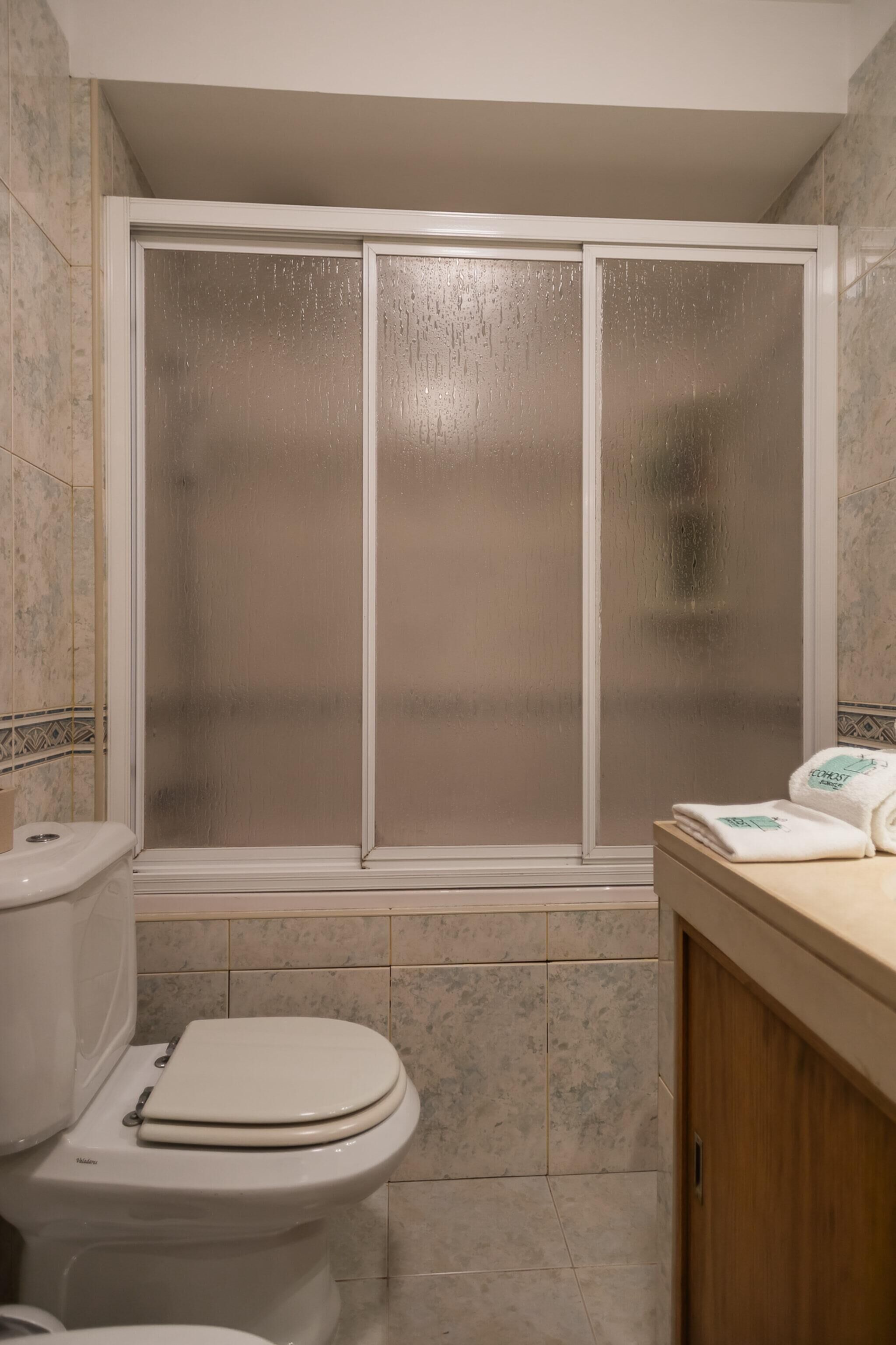 Eco-friendly toiletries, hair dryer, bidet, towels