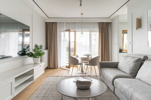 Deluxe Apartment, Balcony, Courtyard View | Living room