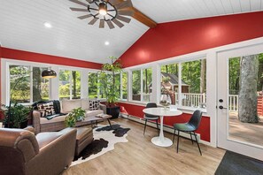 Smart TV, fireplace, books