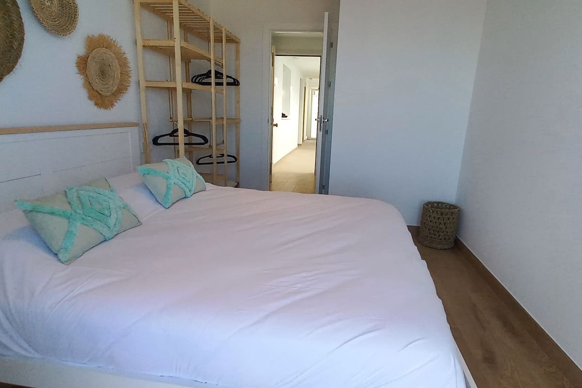 2 bedrooms, blackout curtains, iron/ironing board, free cots/infant beds