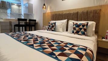 Deluxe Studio, City View | In-room safe, desk, laptop workspace, free WiFi