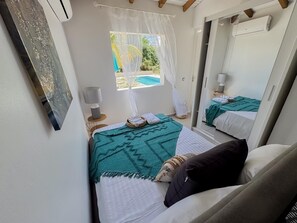 2 habitaciones, tabla de planchar con plancha, cuna de viaje y wifi 