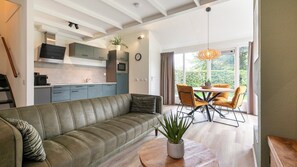 Bungalow (A Plus Bungalow 4) | Living room | TV - Summio Bungalowpark Het Hart van Drenthe (Zwiggelte)