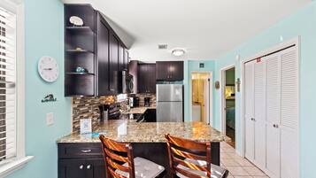 Condo, 1 King Bed with Sofa bed, Patio, Garden View (Beachwood Villas Unit 4A) | Private kitchen | Fridge, microwave, oven, stovetop