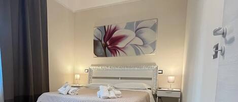 1 غرفة نوم وملاءات أسرّة