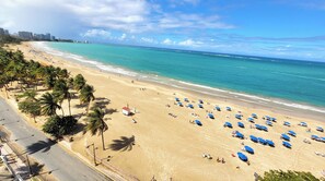 On the beach, sun loungers, beach towels