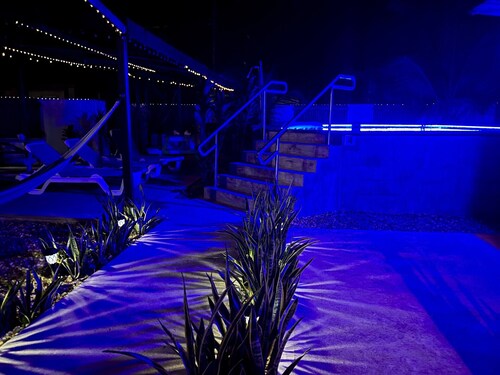 This charming two-bedroom cabana invites you to unwind in a serene escape.